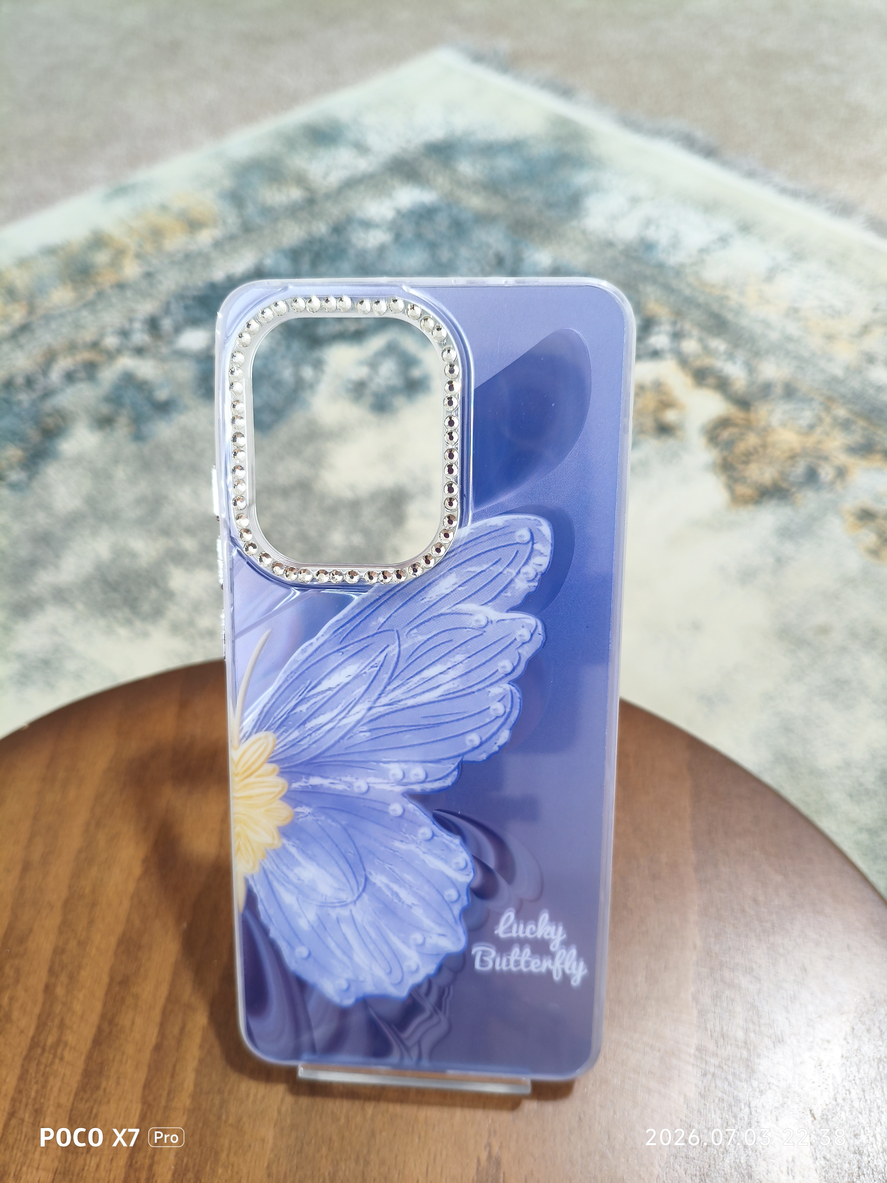 قاب دخترانه نگین‌دار لوکس طرح پروانه مگ‌سیف Xiaomi poco X7 pro| رنگ آبی