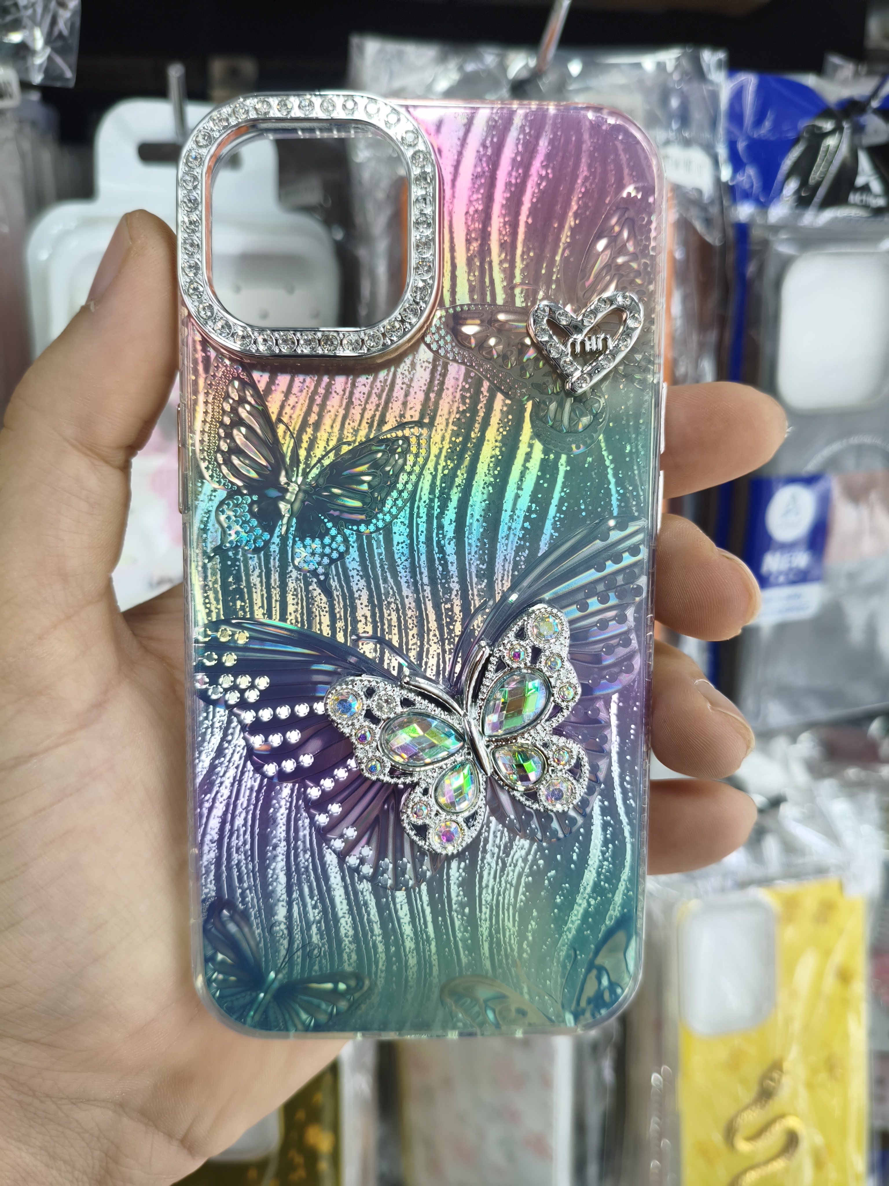 قاب گوشی iPhone 13/14 طرح پروانه نگین‌دار چند رنگ