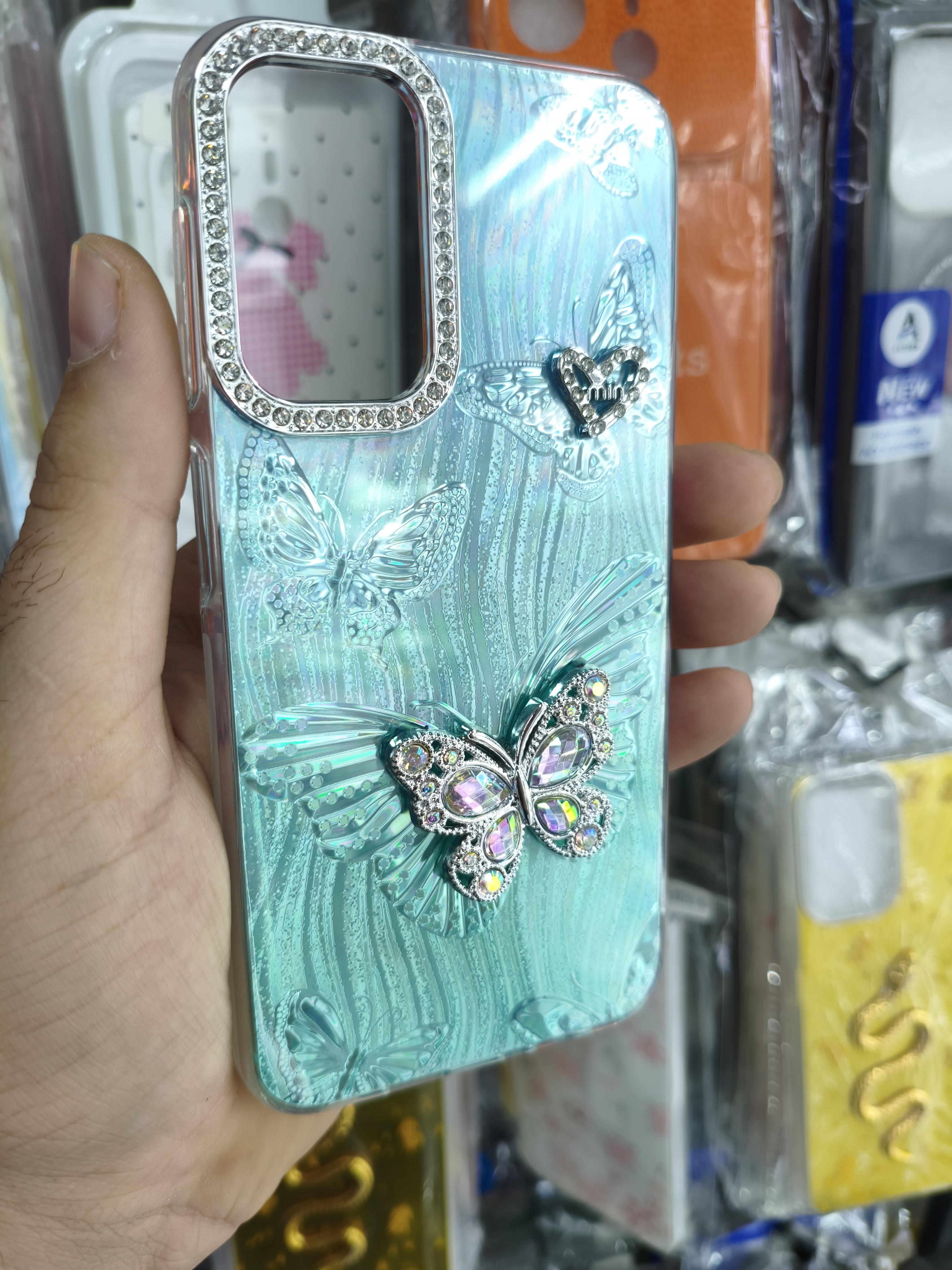 قاب گوشی Samsung A24 طرح پروانه نگین‌دار رنگ آبی فیروزه ای