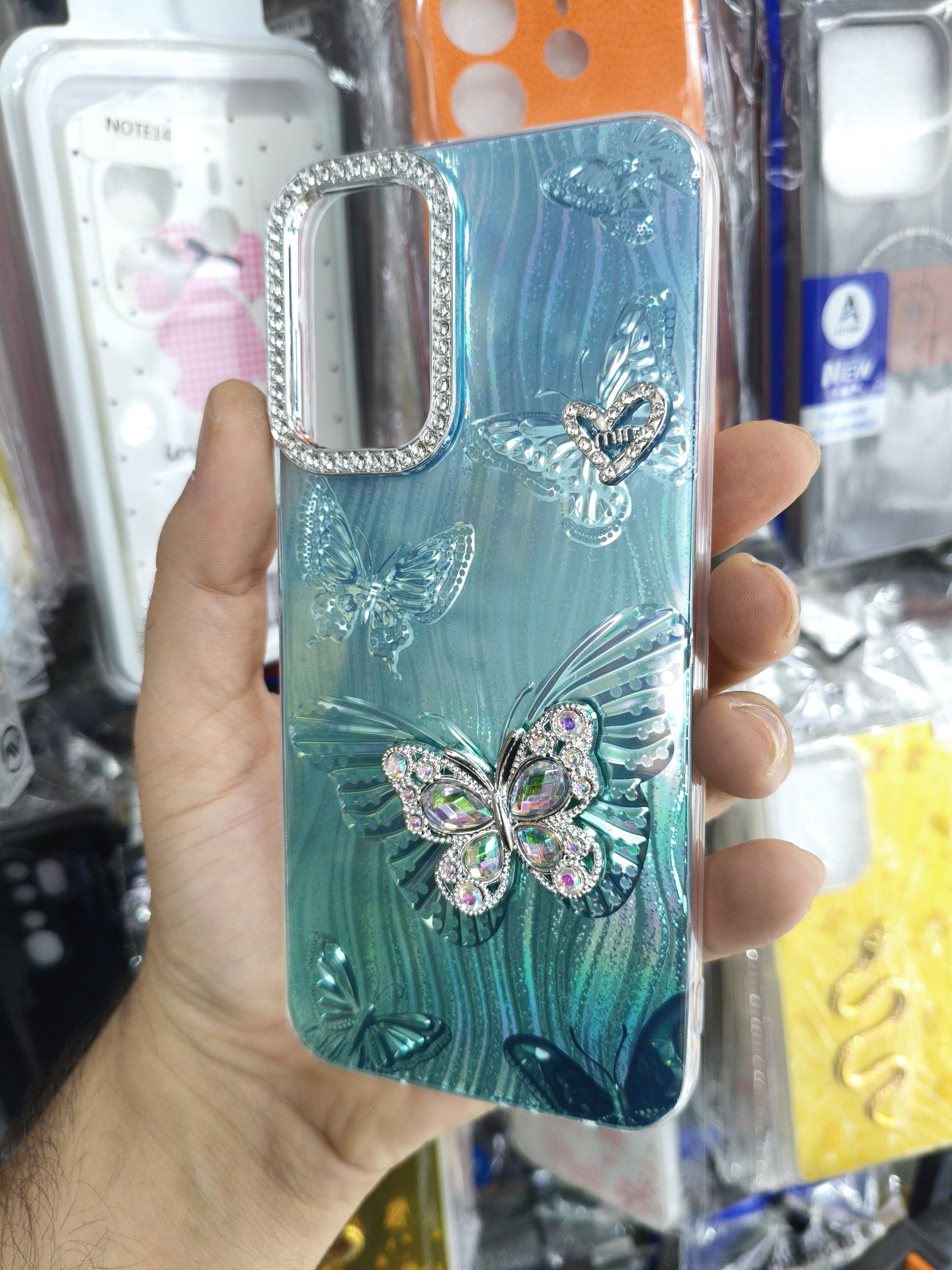 قاب گوشی Samsung A14 طرح پروانه نگین‌دار رنگ آبی فیروزه ای